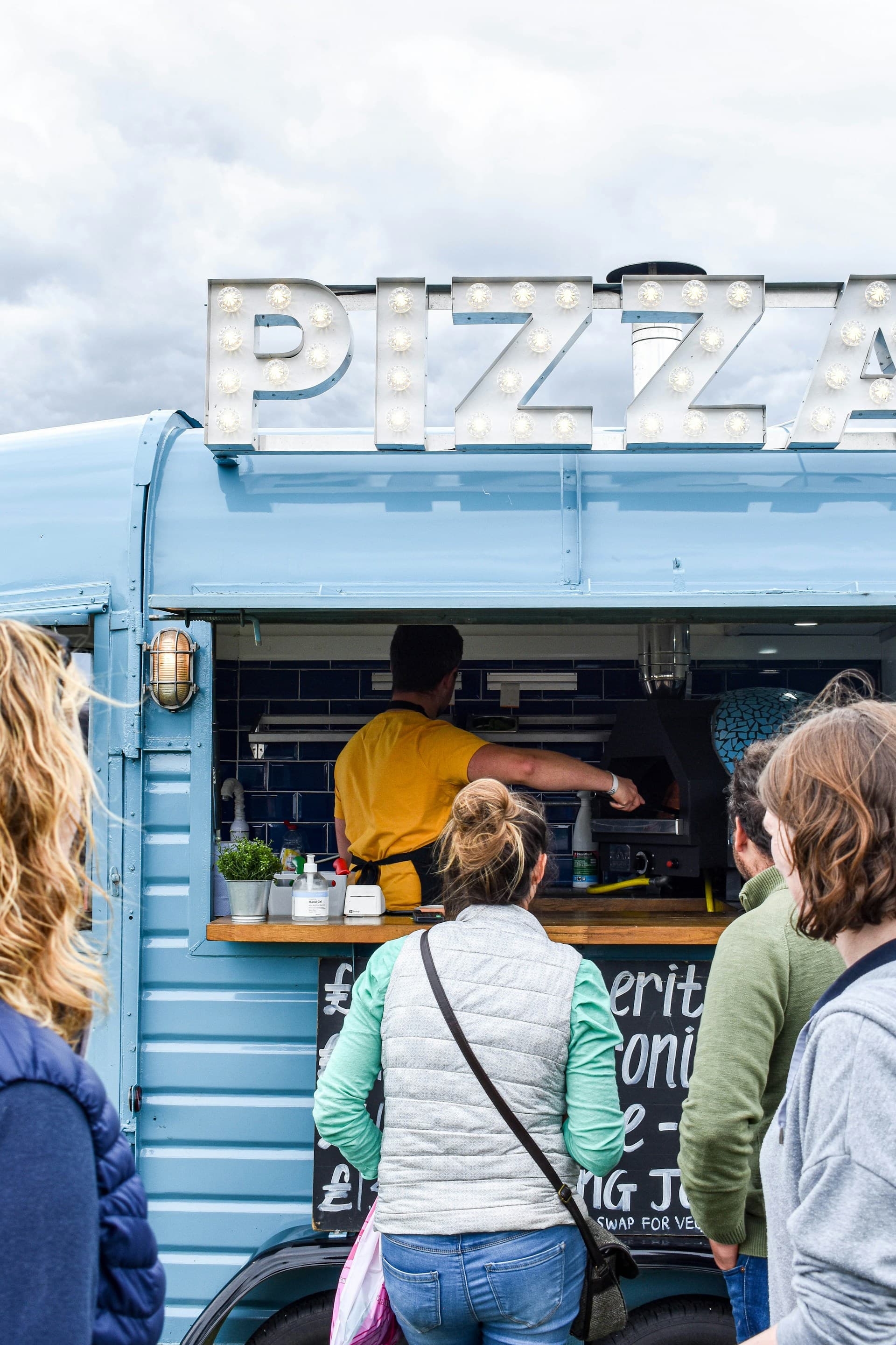Food truck serving guests at an outdoor event