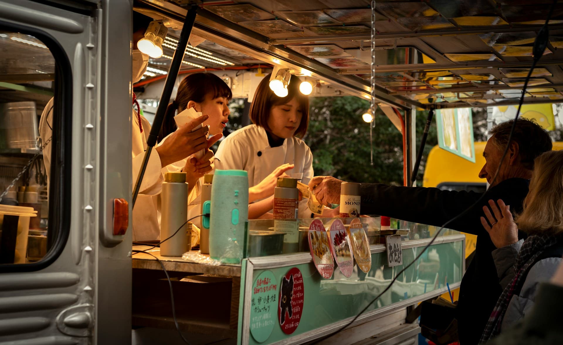 Guests ordering from a food truck