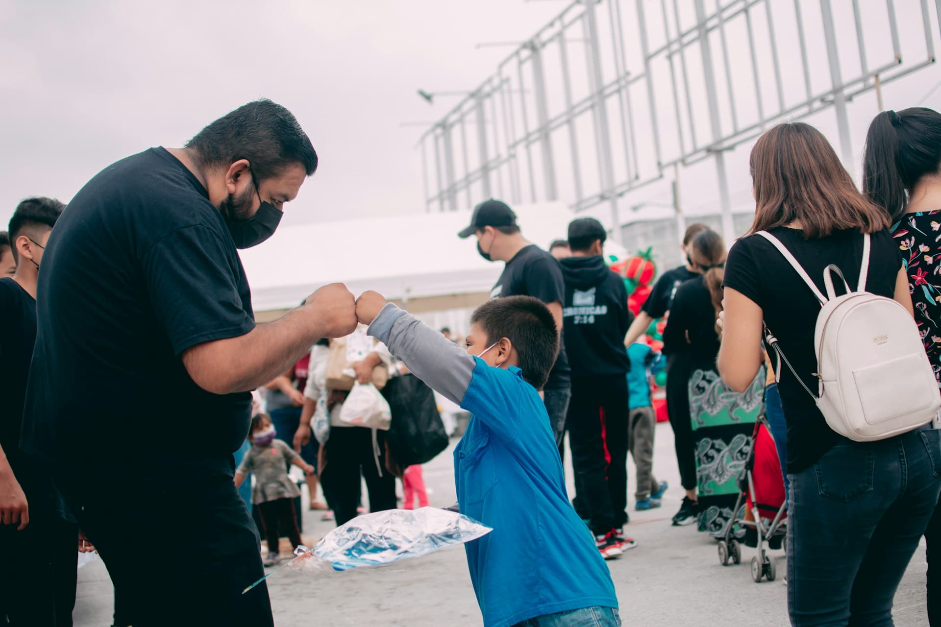 Donors and volunteers gathering at a charity event